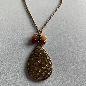 Chaps pendant with real gemstone accents.